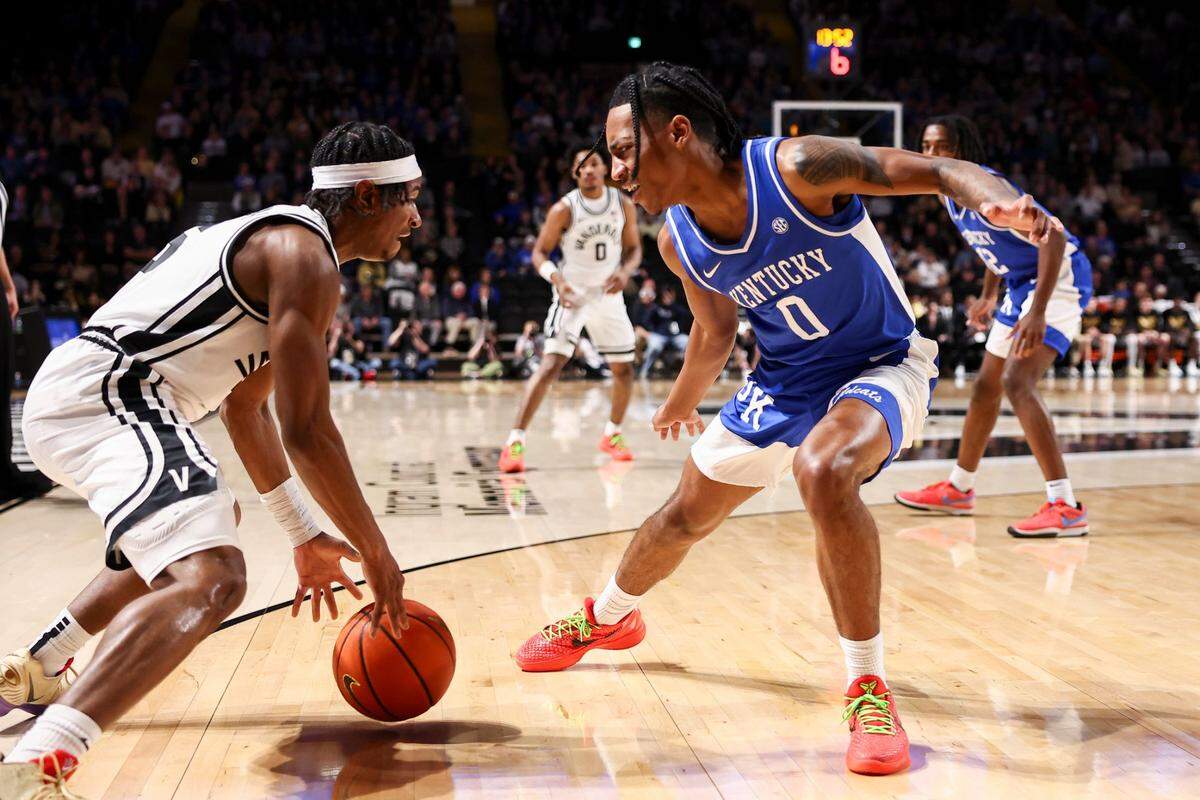 Kentucky’s Rob Dillingham guards Vanderbilt’s Ezra Manjon during the Wildcats’ 109-77 win over the Commodores on Tuesday night. UK allowed 1.07 points per possession against Vanderbilt.