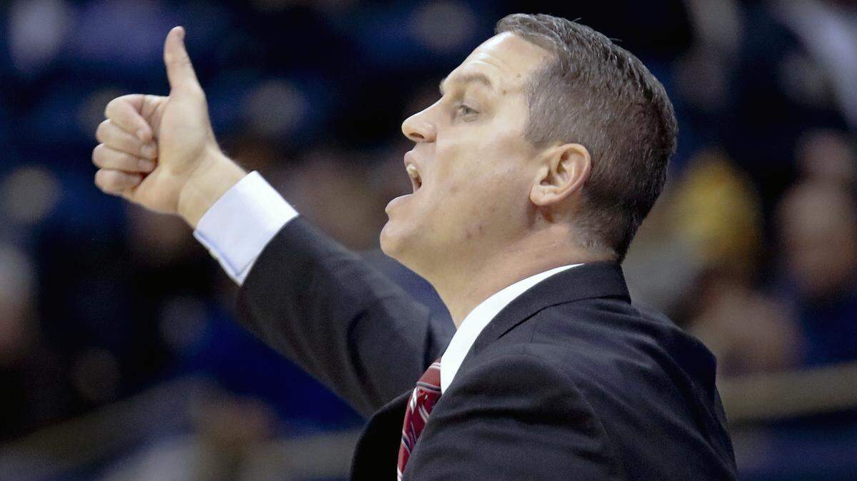 VMI Coach Dan Earl signaled to his team during its 94-55 loss at Pittsburgh on Nov. 9.
