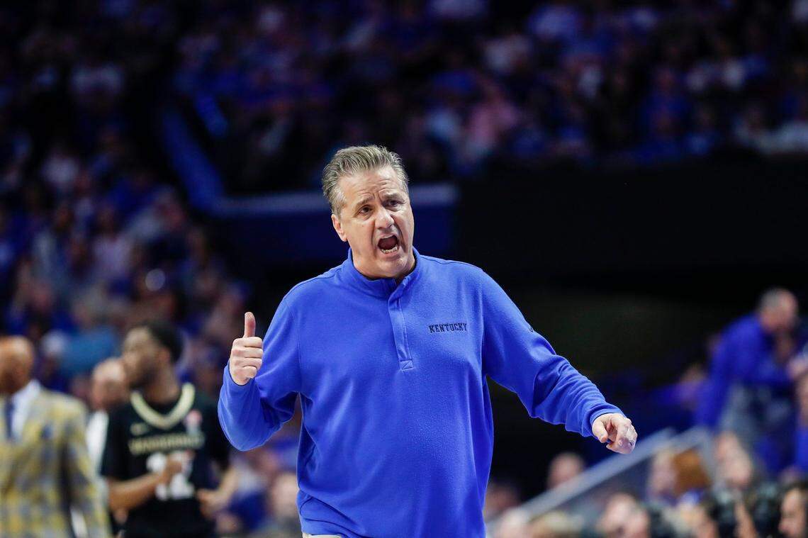 Kentucky head coach John Caliapari talks to the bench players during Wednesday’s game against Vanderbilt at Rupp Arena.