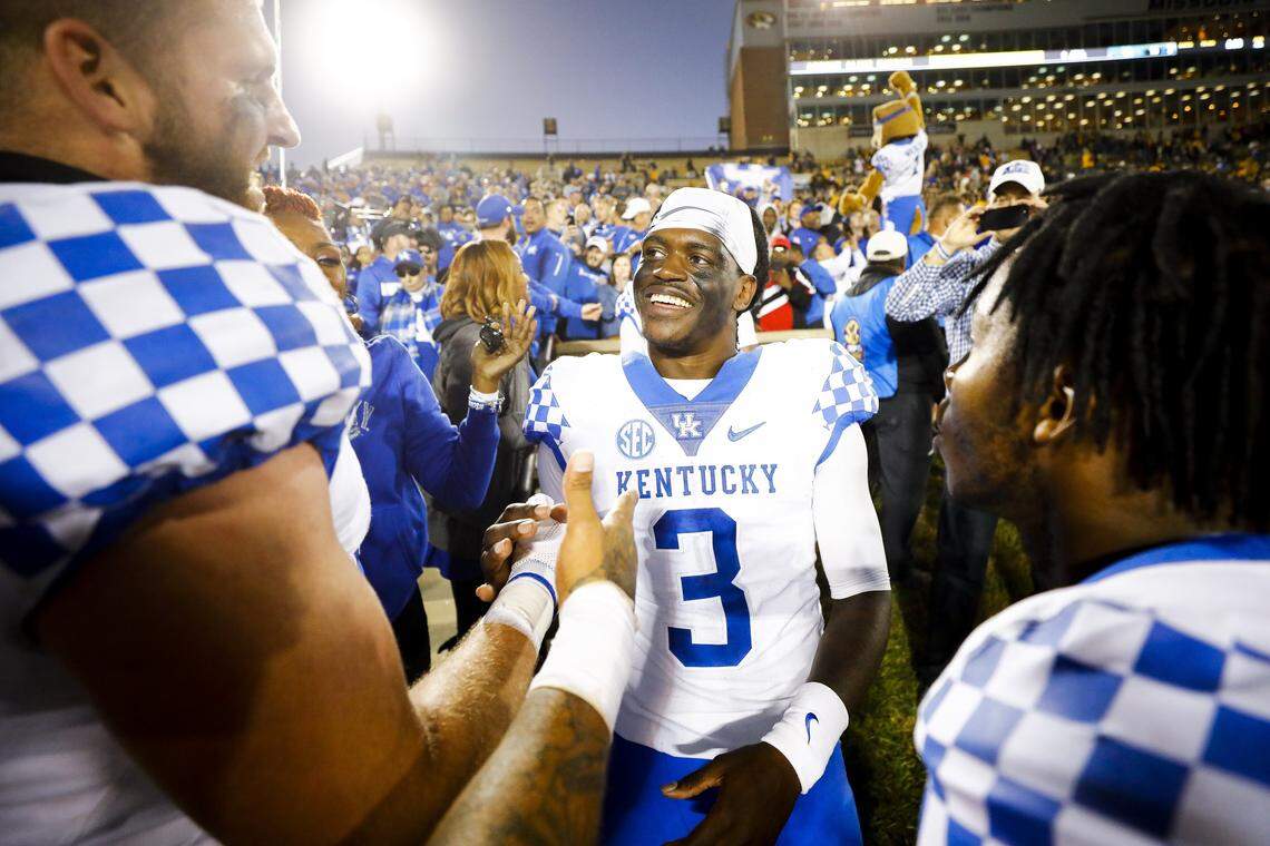 Kentucky quarterback Terry Wilson (3) celebrated with tight end C.J. Conrad after their game-winning touchdown connection against Missouri in 2018.