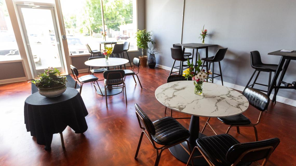 At the front of the store, Cibon has tables for customers to enjoy wine and cheese and charcuterie.