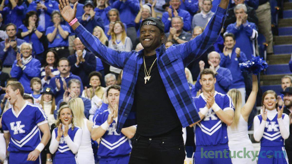 Former Kentucky star Julius Randle made the "Y" in the "Kentucky" cheer during a timeout in the Wildcats' game against North Carolina.