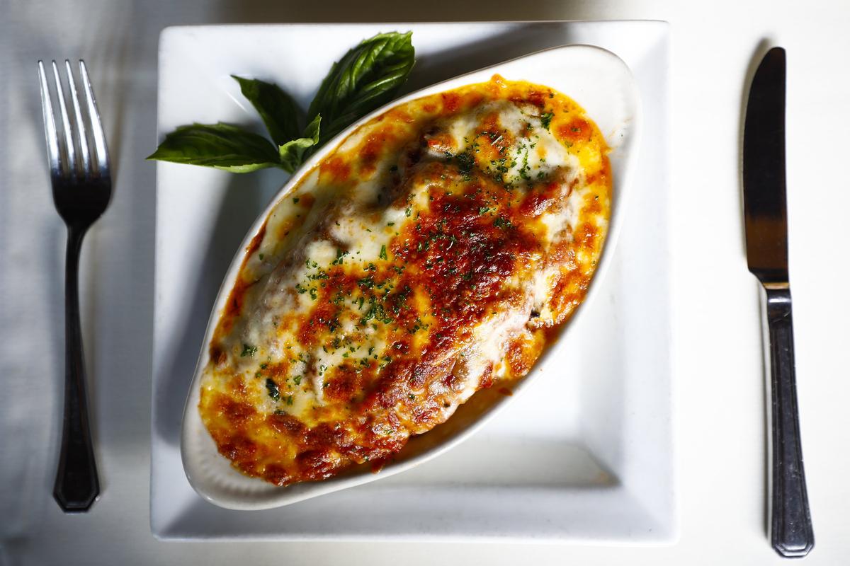 Lasagna filled with beef, pork and ricotta cheese covered with Bolognese sauce and melted Parmesan  at Portofino in Lexington.