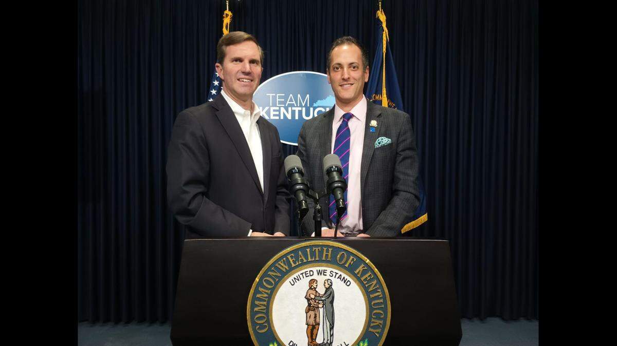 Gov. Andy Beshear, left, celebrates the formation of the Kentucky Antisemitism Task Force with Rep. Daniel Grossberg, D-Louisville.