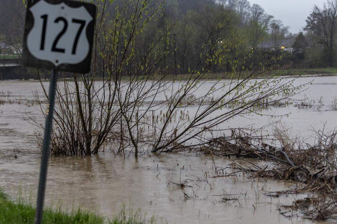 Water floods a field near Randolph Street in Liberty, Ky., on Friday, April 4, 2025.