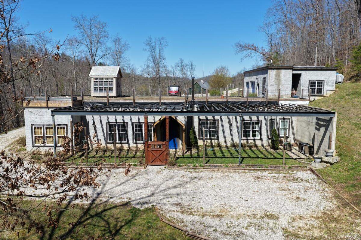 Witheniwe Farms outside Louisa in Lawrence County, Ky., is a 552-acre property that includes four residences, including this one, which is known as the Hobbit House.