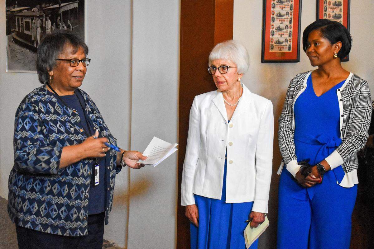 Capital City Museum board member Sheila Mason, left, talked about her lifelong friend and fellow Frankfort native George C. Wolfe, in a press conference at the museum on June 3. Others in the photo are board secretary Betty Barr (center) and Sonia Sanders, who represented Kentucky State University, which Wolfe attended for a year before transferring to Pomona College in California.