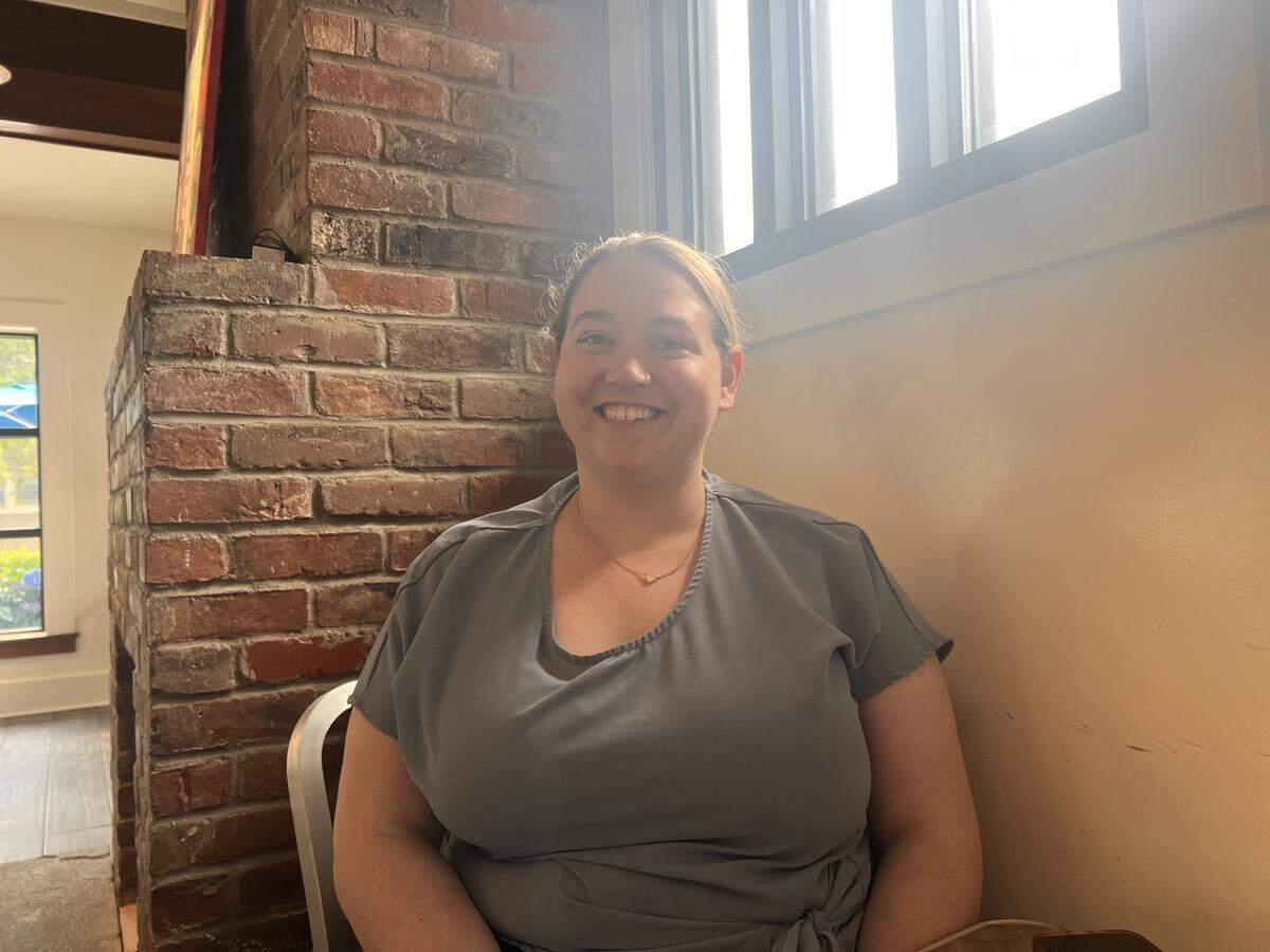 Karly Walker, a 28-year-old resident of the Hamburg area poses for a photo at Kenwick Table in Lexington, Kentucky on June 20, 2024.