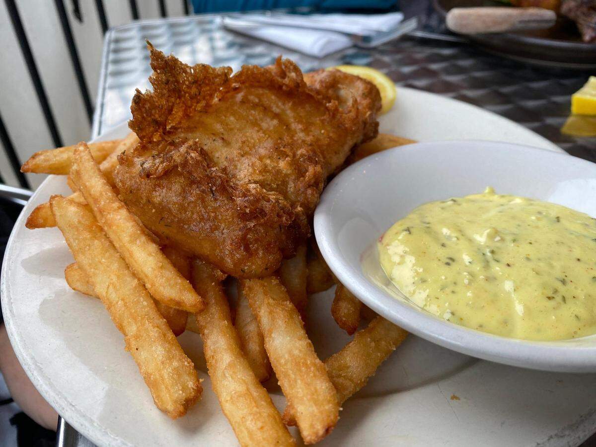 The Country Boy beer battered fish and chips from the Brown Barrel and Blind Harry’s in downtown Midway is served with tarter sauce.