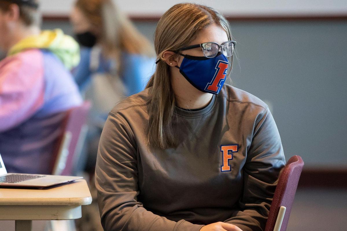 Macy Dungan, a senior at Frankfort High School, attends an in-person class held at the Thomas D. Clark Center for Kentucky History in Frankfort, Ky., Friday, Nov. 6, 2020, before in-person classes were suspended throughout the state.