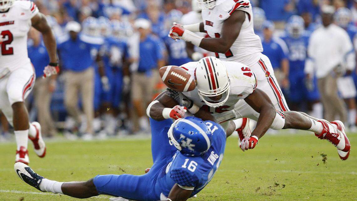 Louisville linebacker Dexter Heyman (46) forced a fumble by Kentucky's La'Rod King the first half of the Cardinals' 24-17 victory last season.      