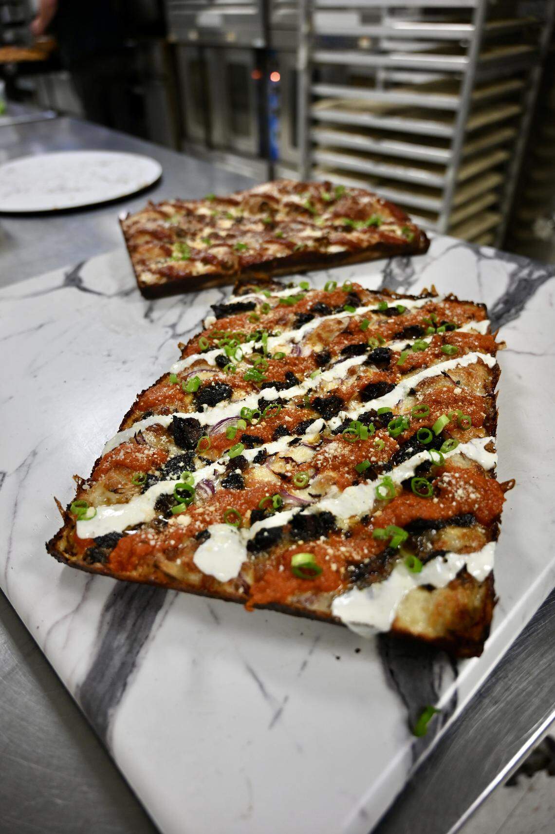 Rise Up pizza food truck has two offerings for Lexington Pizza week, one of which, is called The Greatest of All Time, shown here.