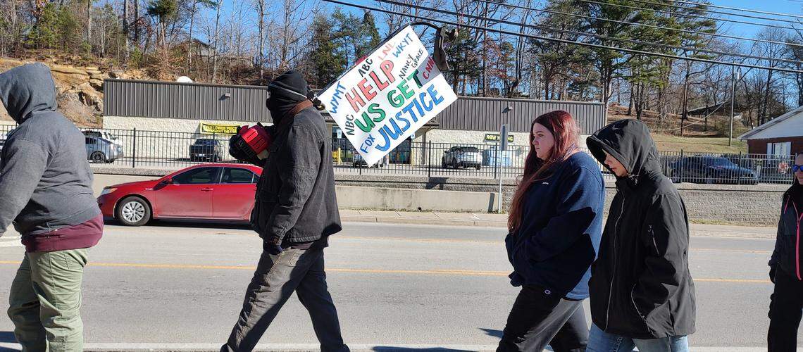 Protesters marched to a parking lot across from the London Police Department in Laurel County, Ky., Saturday, Jan. 4, 2025, to call attention to the death of Douglas Harless. Harless died after being shot at his home by police who apparently had intended to go to a different address nearby to execute a search warrant.
