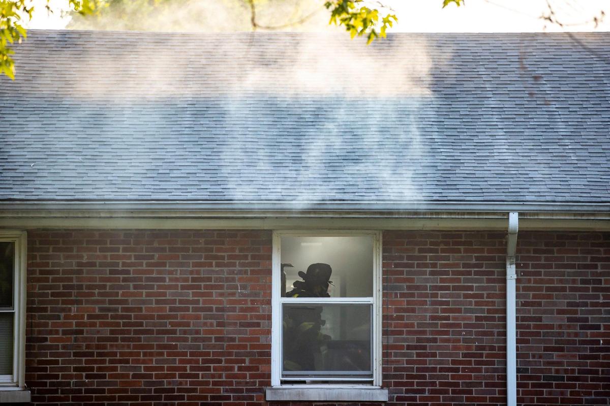 Members of the Lexington Fire Department respond to a structure fire on Cambridge Drive in Lexington, Ky., on Wednesday, Aug. 2, 2023.