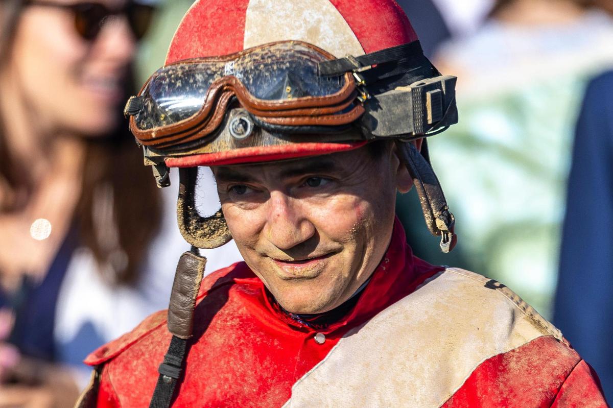 Jockey Brian Hernandez Jr. celebrates after winning Tuesday’s Blue Grass Stakes atop Burnham Square at Keeneland. Hernandez won last year’s Kentucky Derby with Mystik Dan.