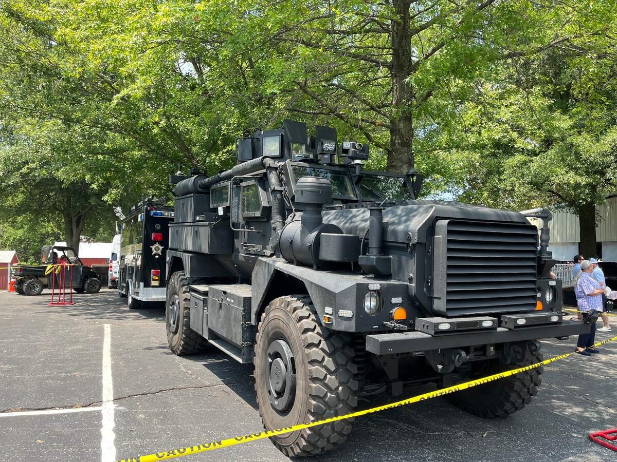 A military-style truck sits just outside the speakers’ pavilion at St. Jerome’s Fancy Farm Picnic.