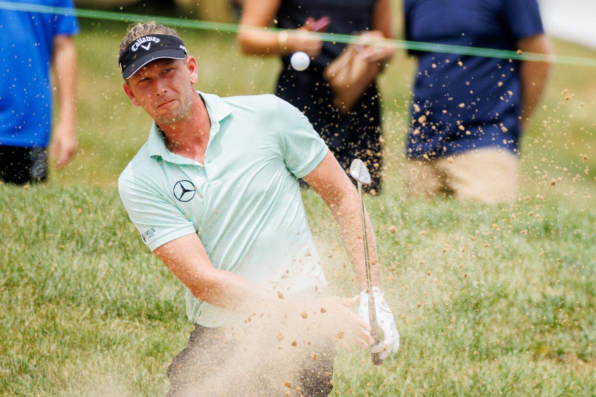 Marcel Siem hits a bunker shot went in for a birdie on No. 9 on Thursday.