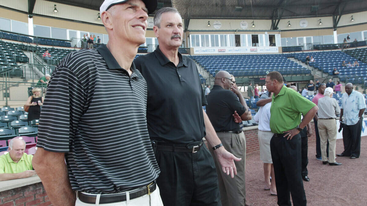 Bobby Jones, left, Tom Burleson and other members of the 1972 Olympic basketball team took in the atmosphere at the ballgame on Thursday.