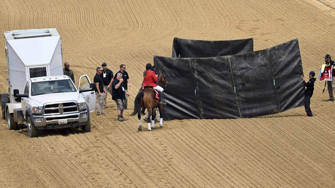 Bob Baffert-trained horse and favorite Havnameltdown, behind the curtain, had to be euthanized Saturday, May 20, 2023, during the sixth race of Preakness Day at Pimlico Race Course in Baltimore. (Jerry Jackson/Baltimore Sun/TNS)