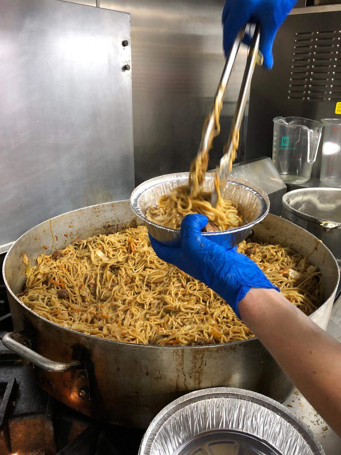 After Gov. Andy Beshear ordered Kentucky restaurants to close to dining in, Dan Wu sent unused Lexington Pasta noodles to FoodChain, which promptly turned them into meals for those in need.