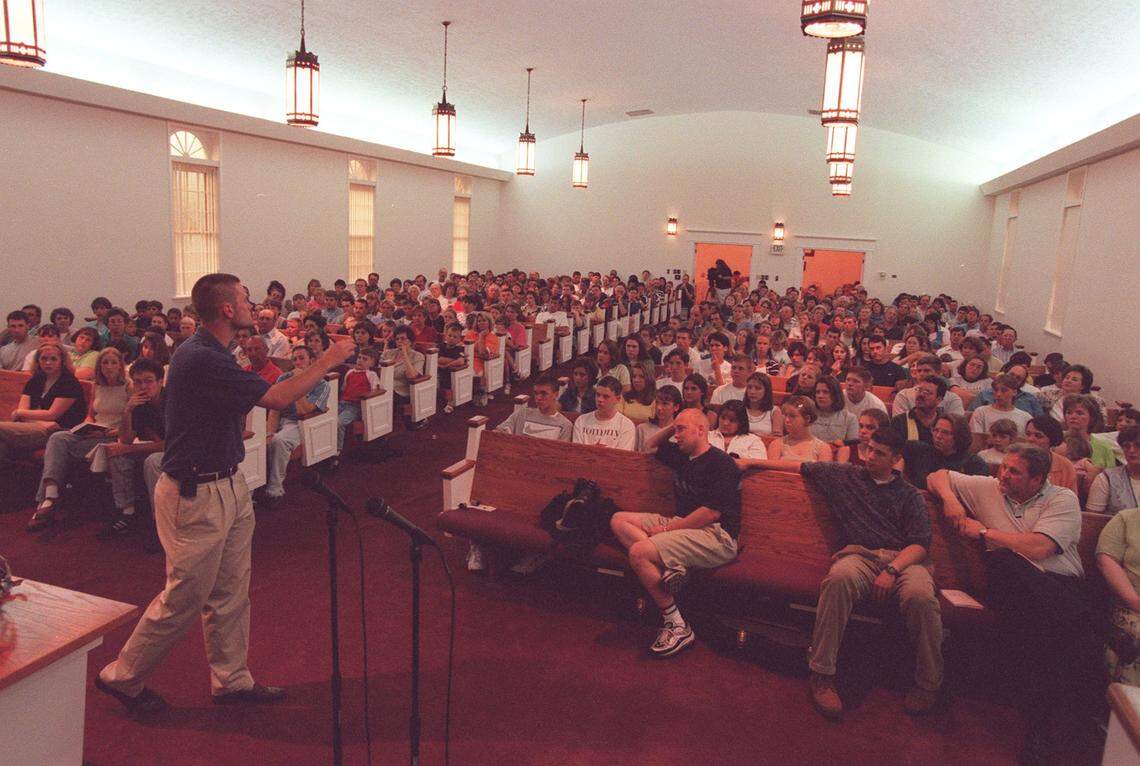 Cameron Mills delivers his message at the Lowell Avenue Baptist Church in Campbellsville on June 3, 1998. After his college days as a UK basketball player, Mills entered ministry work.