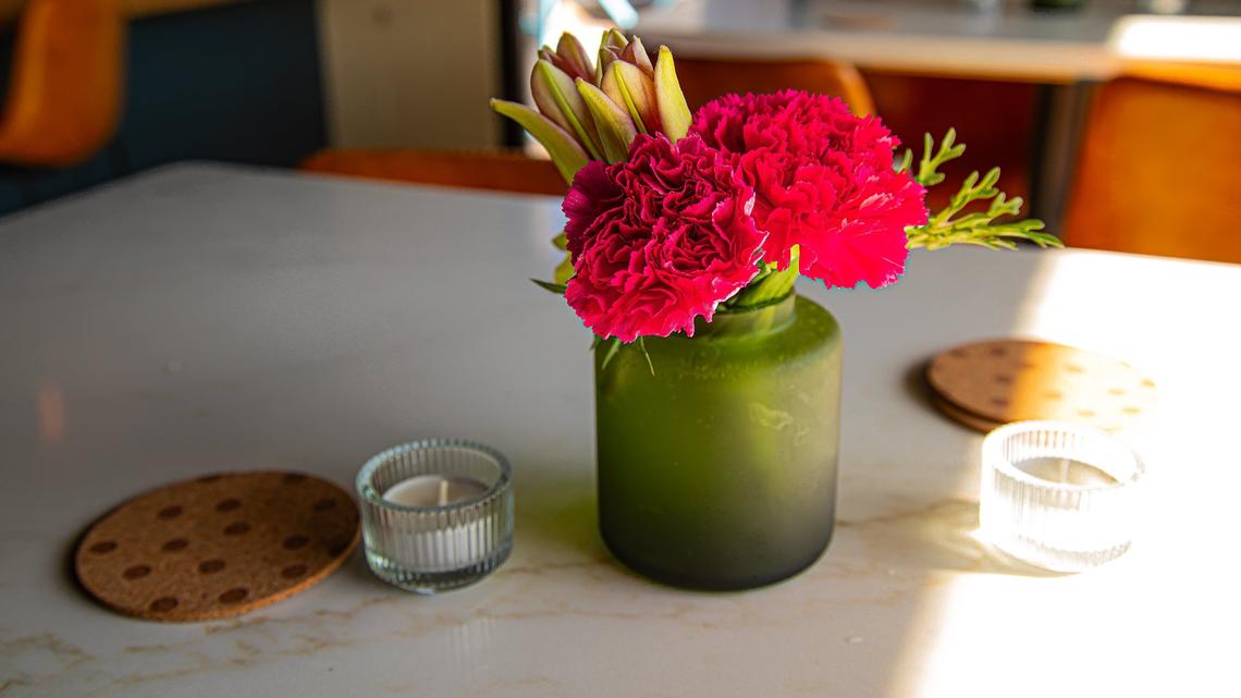 Freshly picked flowers serve as a natural centerpiece at Minton’s new 701 National Ave. location.