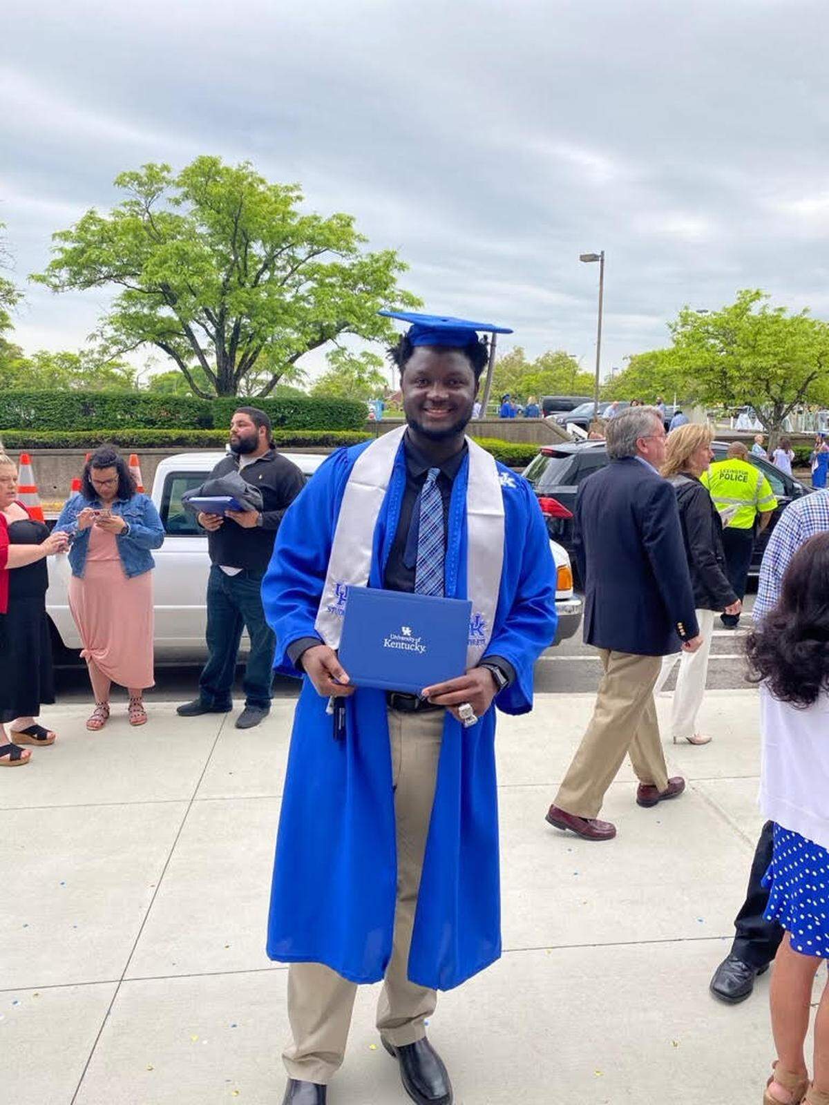 Abule Abadi-Fitzgerald graduated with a bachelor’s in communications in May. He’s been taking graduate courses in design while playing for the football team this fall.