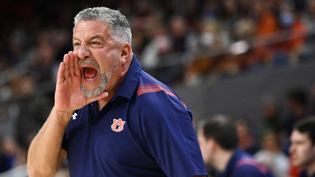 Auburn head coach Bruce Pearl talks to his team during the first half against Florida on Jan. 8.