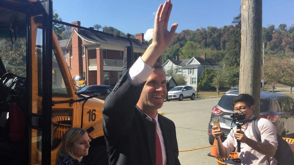 Governor Andy Beshear embarked from a Frankfort Independent school bus Wednesday, Oct. 2, 2019, to hold a news conference at Frankfort High School.
