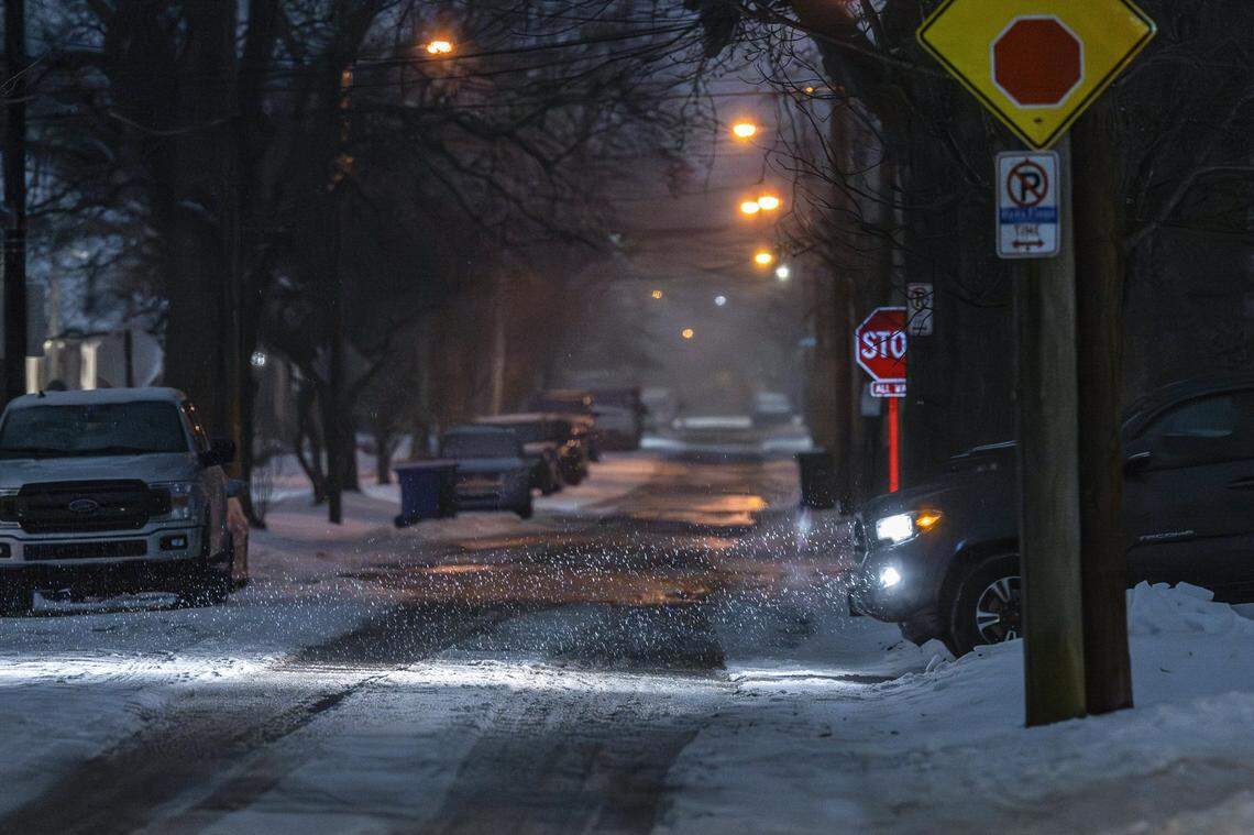 Snow falls along Aurora Avenue in Lexington, Ky., on Tuesday, Feb. 3, 2026.