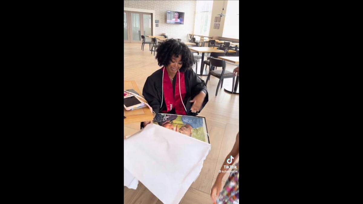 In a now-viral TikTok, future University of Kentucky freshman KaLeah Steede opens a portrait of her father standing next to her in a UK shirt.