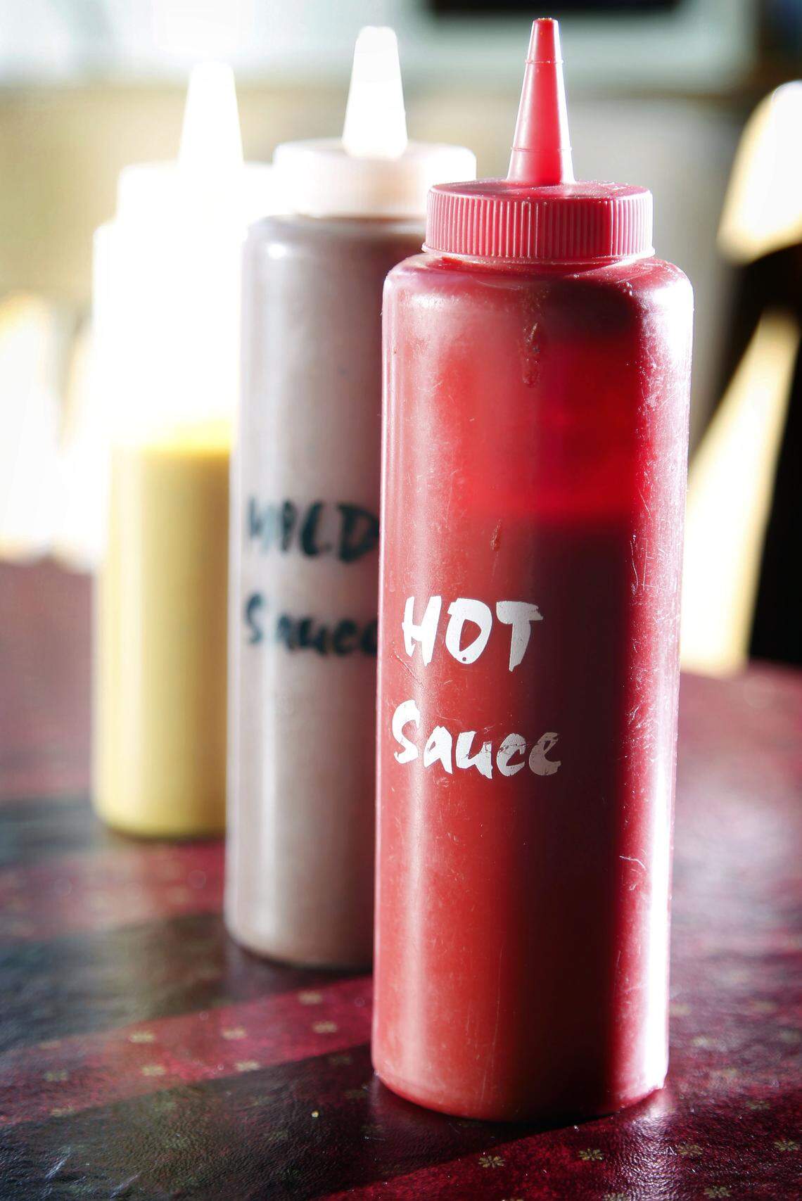 Hot, mild and mustard sauce at Billy’s Bar-B-Q, May 7, 2013.