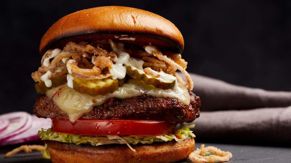 Firebirds Wood Fired Grill’s Durango Burger, which is chili spiced and served with pepper jack cheese, fried onions and roasted garlic ranch dressing.