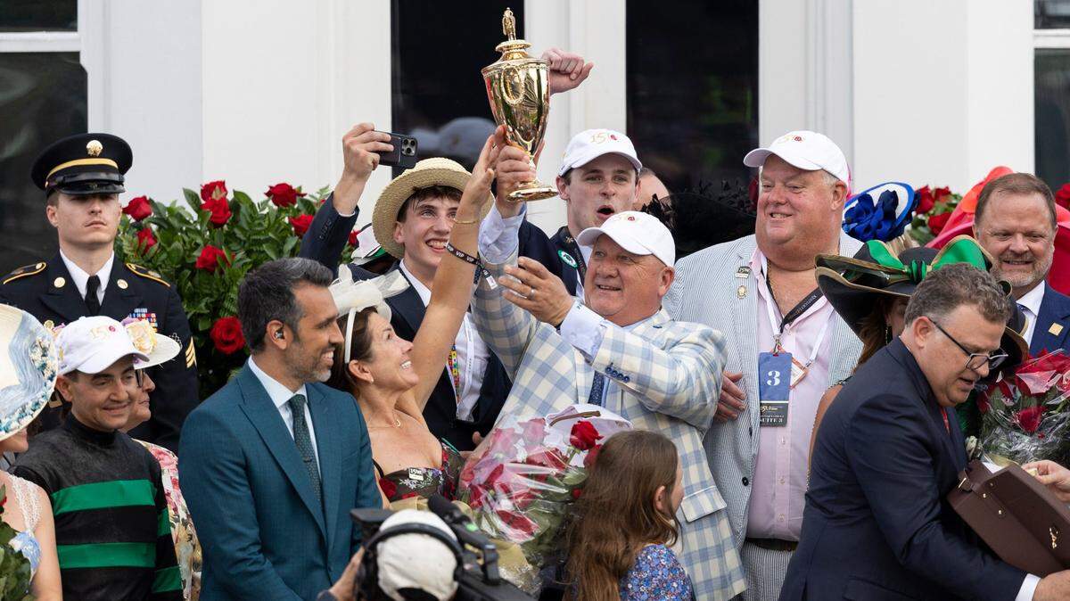 Trainer Kenneth McPeek celebrates winning the 150th running of the Kentucky Derby with Mystik Dan and Brian Hernandez, Jr. at Churchill Downs in Louisville, Ky, Saturday, May 4, 2024.
