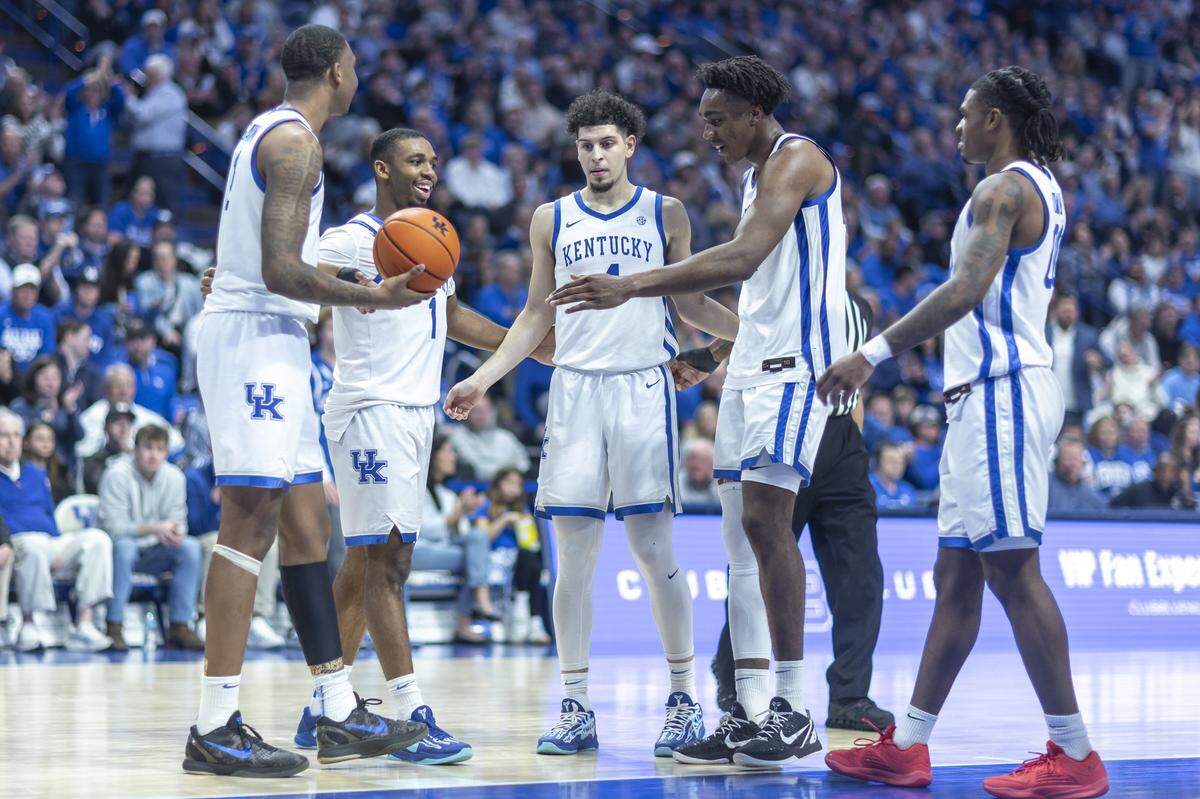 The Wildcats huddle during a stop in play during Saturday’s game against South Carolina at Rupp Arena.