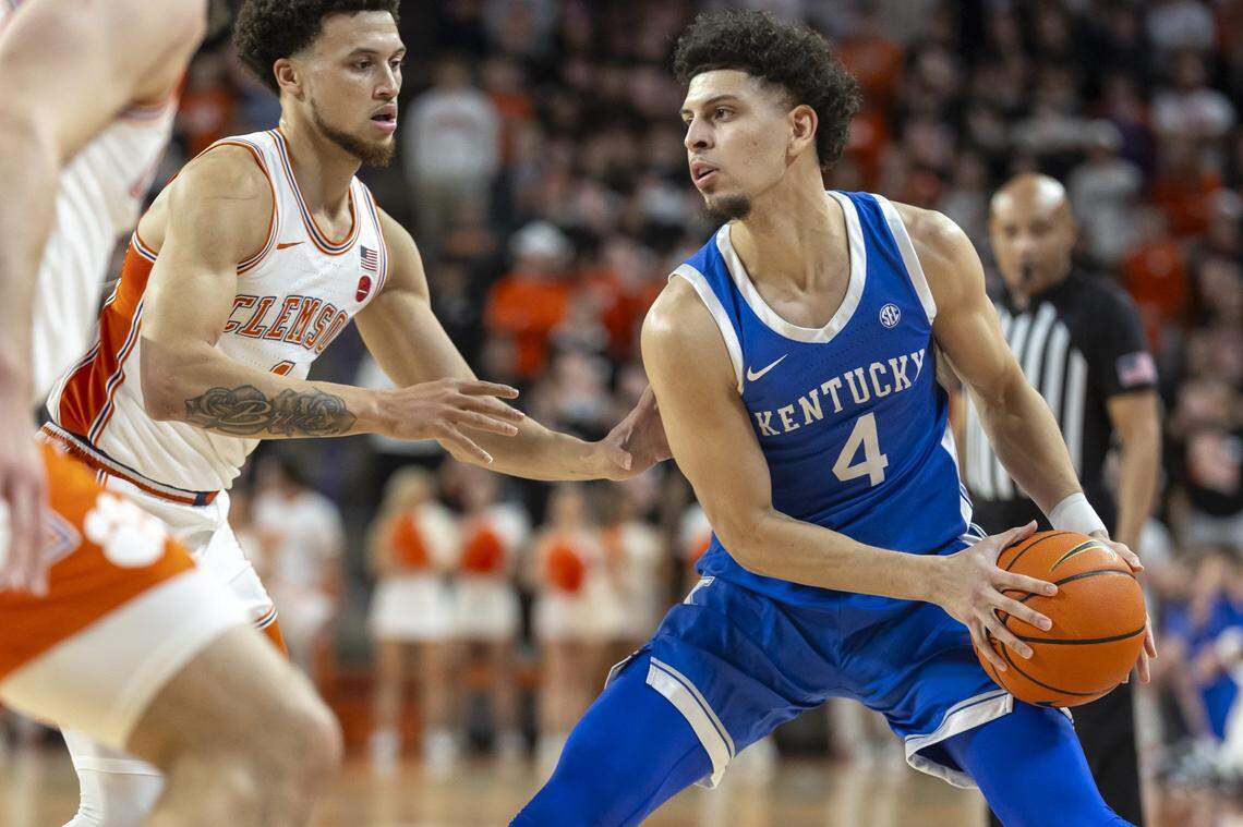 Kentucky guard Koby Brea (4) looks to move the ball as Clemson guard Chase Hunter (1) defends during Tuesday’s game.