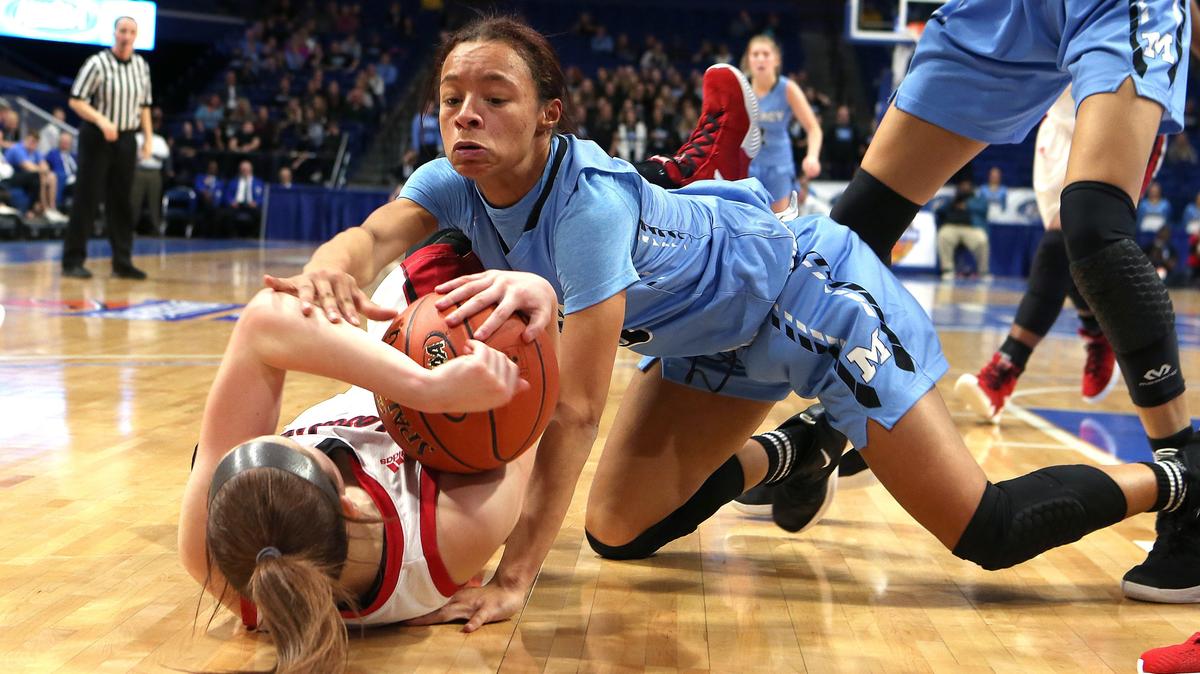 Mercy’s Jaylyn Porter battled for the loose ball against GRC’s Kennedy Igo Wednesday during the KHSAA Girls’ Sweet Sixteen at Rupp Arena in Lexington.