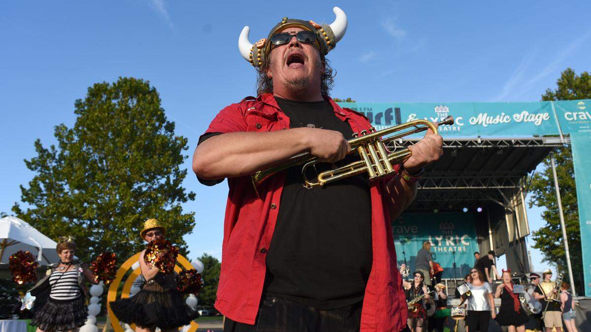 Leif Erickson Rigney of the March Madness Marching Band exhorts the 2017 Crave crowd. March Madness will be back for this year’s Crave.