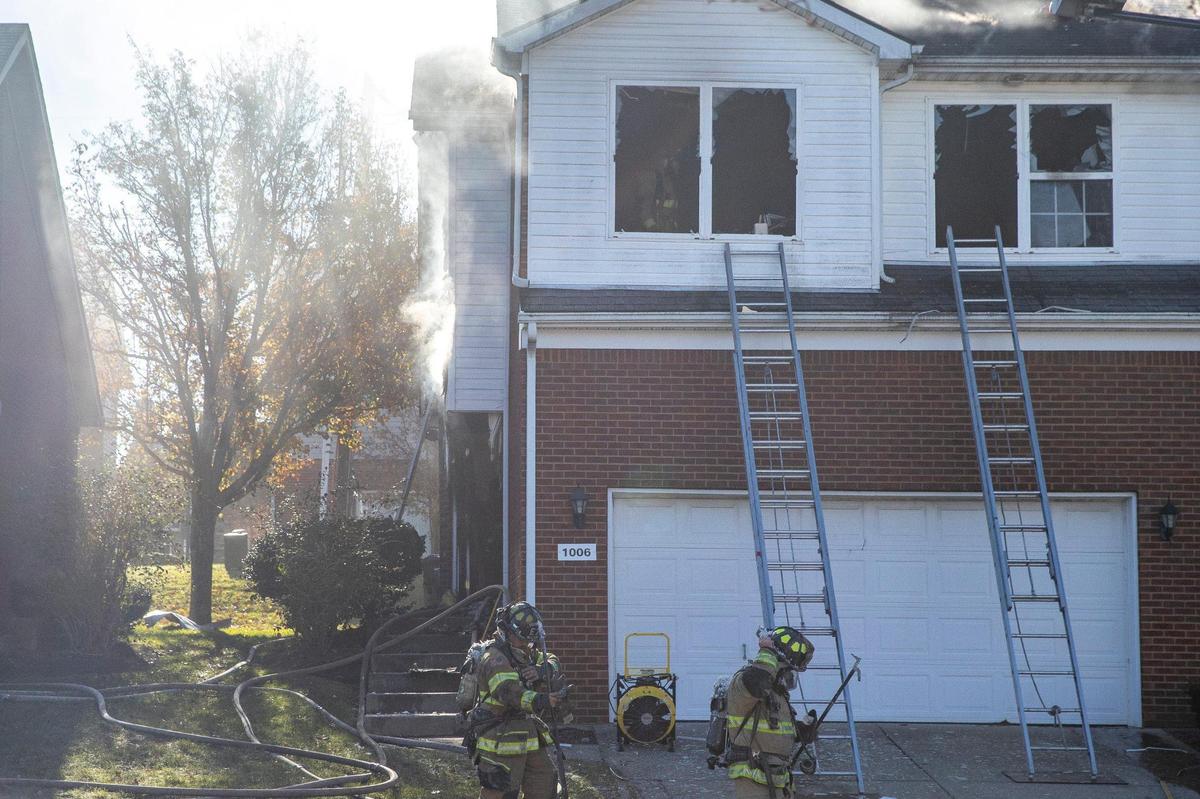 Lexington firefighters worked at the Fiddler Creek Way fire Tuesday.