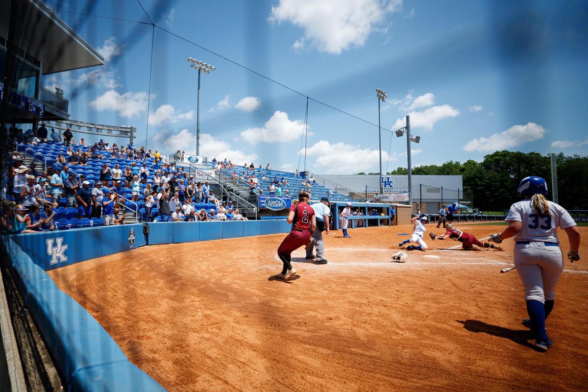 Lexington Catholic’s Lydia Kennedy is tagged out at home during the state softball semifinals against McCracken County on Saturday. The Knights won won 6-1.