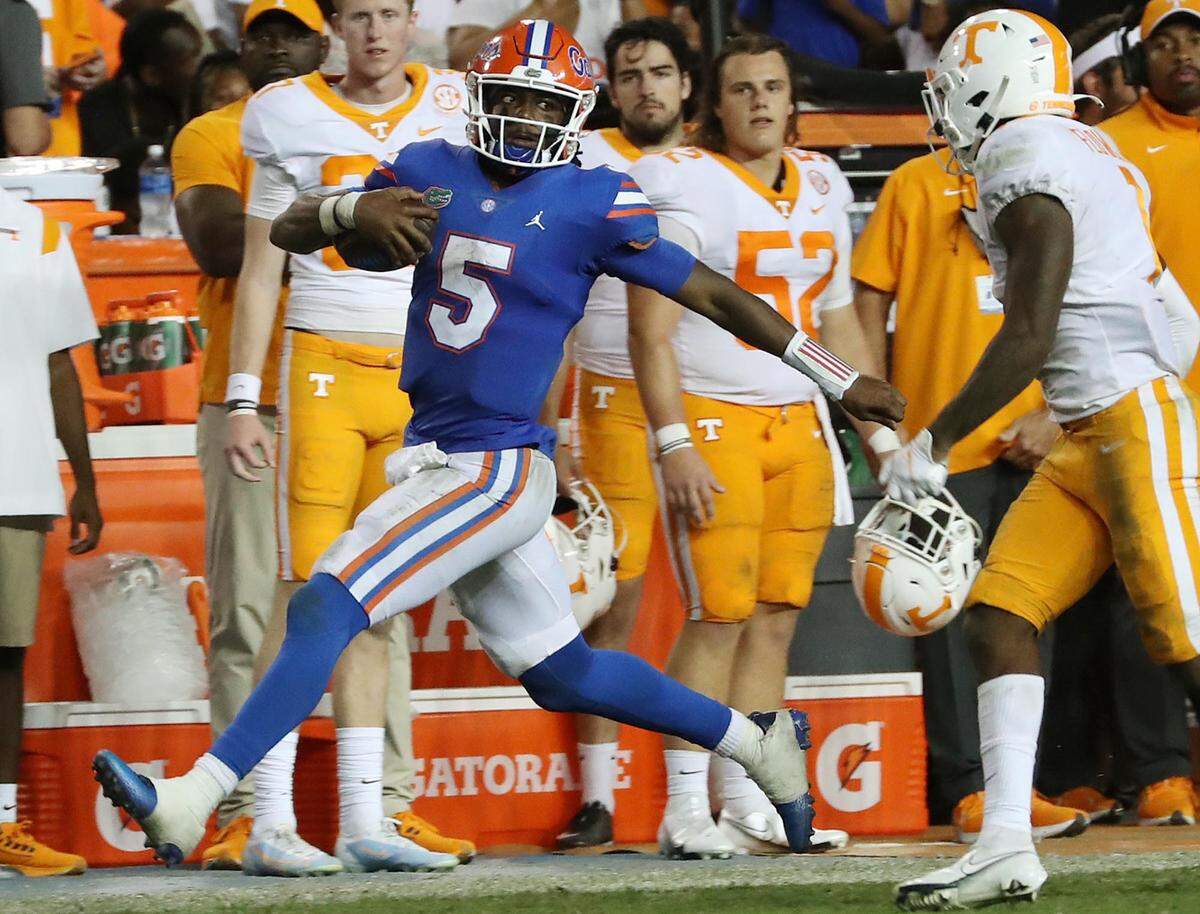 Florida quarterback Emory Jones (5) ran for 144 yards and completed 21 of 27 passes for 209 yards and two touchdowns in the Gators’ 38-14 victory over Tennessee on Saturday at The Swamp.