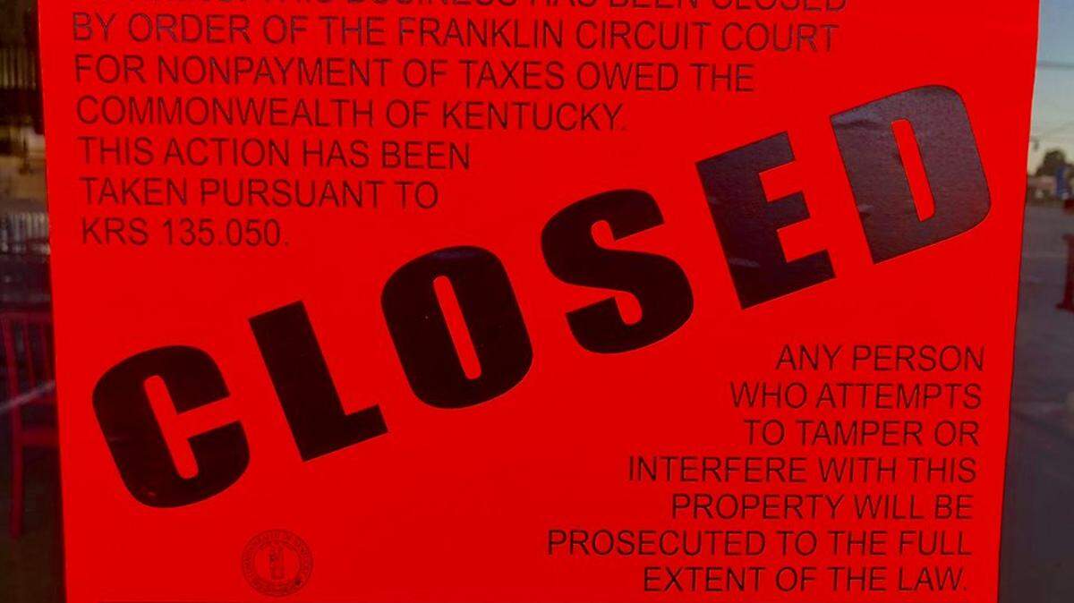 A sign on the door of Life Brewpub says it has been ordered closed by Franklin Circuit Court for non-payment of taxes. According to court records, more than $244,000 in taxes, penalties and fees are owed.