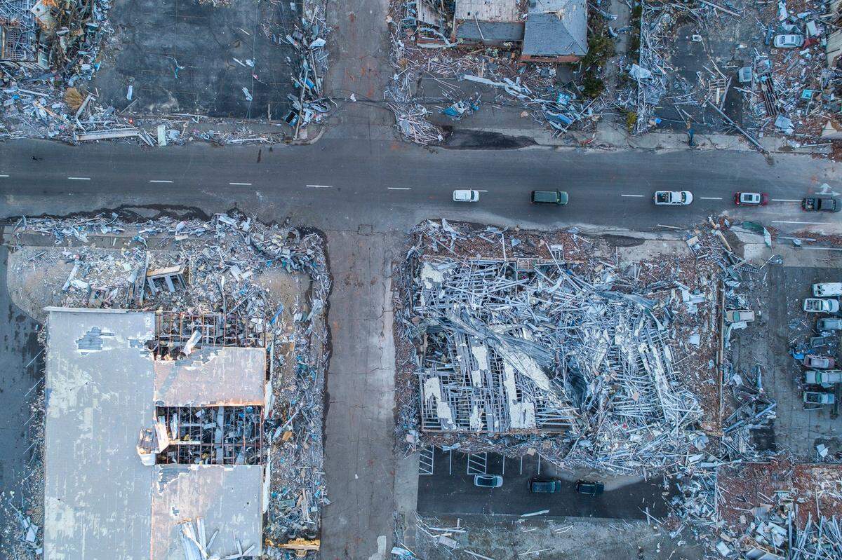 Structures in downtown Mayfield, Ky., are heavily damaged Sunday, Dec. 12, 2021, after a tornado ripped through town Friday night.