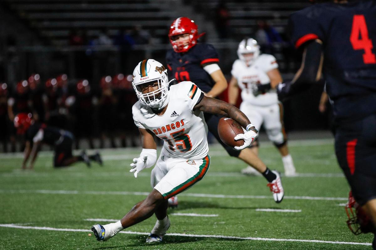 TJ Horton of Frederick Douglass changes direction as he looks for running room Friday night against Scott County. “He’s a beast man,” Coach Nathan McPeek said. “I tell him if he can play like that and run like that and be consistent, he can help us win a championship.”