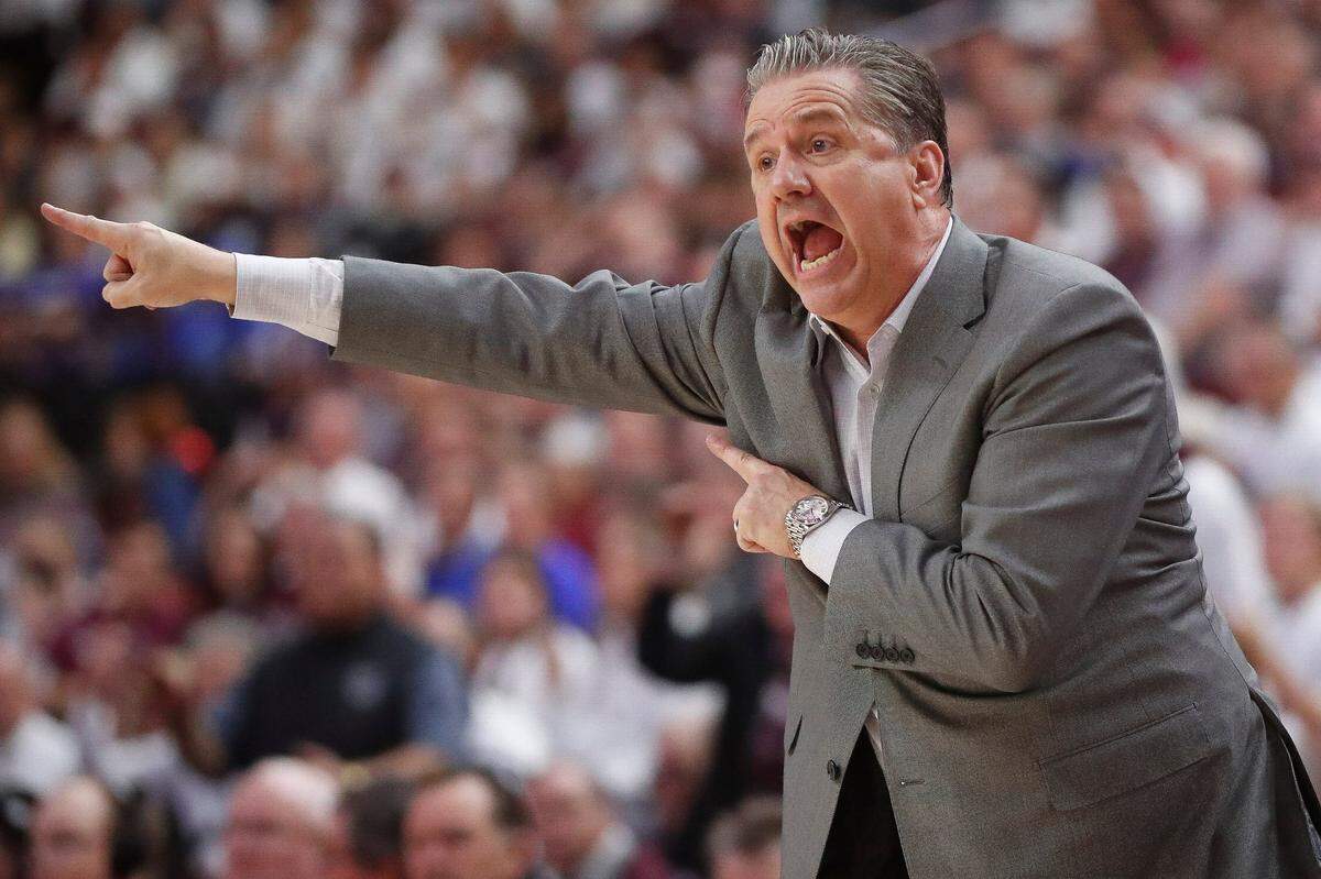 Kentucky Wildcats head coach John Calipari motions down court during a game against the Texas A&M Aggies at Reed Arena in College Station, Texas, Wednesday, Jan. 19, 2022.