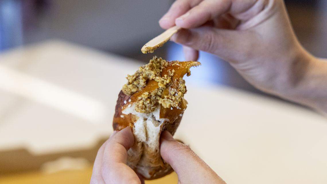 The handmade, authentic German sourdough pretzels from Papa Pretzel, located at The Wandering Bock Pretzel Pub & Brat Haus in Greyline Station, are easy to pull apart and spread any of the homemade mustards or beer cheese on them. 