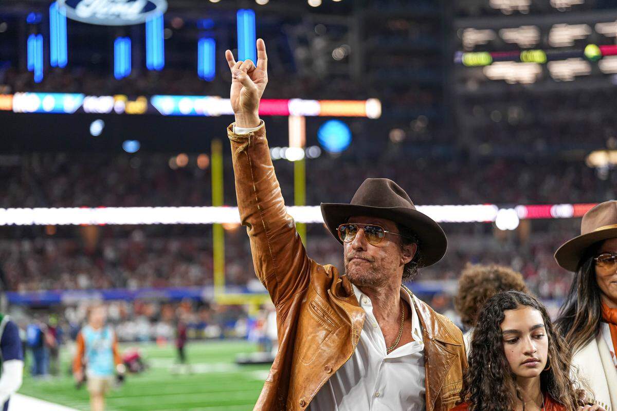 Actor and Texas Longhorns “super fan” Matthew McConaughey gave the “Hook’em Horns” hand gesture prior to Texas’ 28-14 loss to Ohio State last season in the College Football Playoff semifinals. McConaughey’s father, Jim McConaughey, played for coach Paul “Bear” Bryant at Kentucky in 1949.