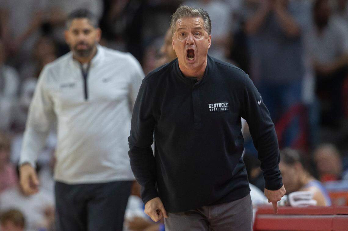 Kentucky head coach John Calipari talks to a referee during Saturday’s game against Arkansas at Bud Walton Arena in Fayetteville, Ark.