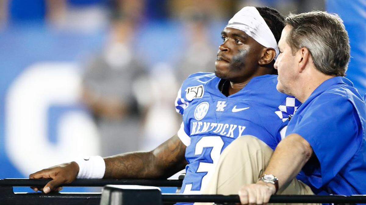 Kentucky quarterback Terry Wilson carted off the field against Eastern Michigan