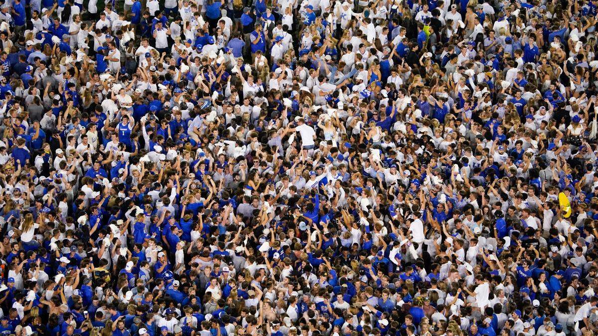 Fans rushed the field after Kentucky defeated Florida at Kroger Field on Saturday Oct. 2, 2021, in Lexington, Ky.